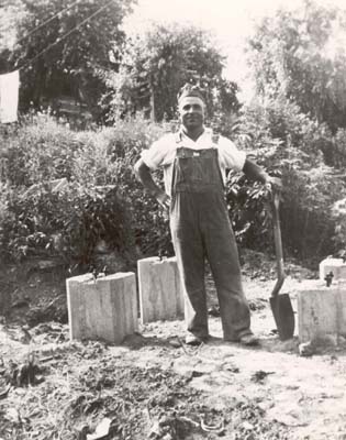 Dominick Nocco lays base for a conveyor belt in the sandbanks, 1940�s