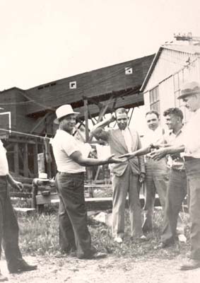Sandminers play traditional Sardinian game called �mura�. Whoever shouts the higher number is the winner, 1950�s.  L-r: Pete DeJana, Paul Bellu, John Nocco, John Porcu, unidentified