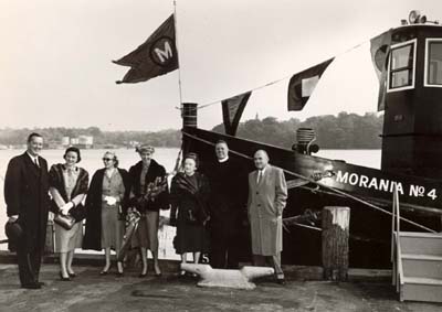 Laphams and McCormacks at launching of tug �Morania No. 4�, October 22, 1957 Photo includes: Msgr. McCormack, Mrs. E. Lapham (sponsor),  Edward Lapham, Mr. McCormack, Mrs. Greenow, Mrs. Ruth Pollock Lapham
