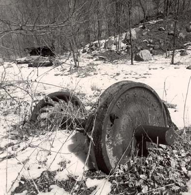 Wheels from one of the carts used on small electric railway that transported sand to barges, 1970�s
