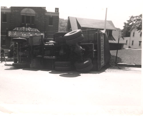 A flipped batch track on Old Northern Blvd., Roslyn, N.Y. (dragged 18 yards), c. 1950