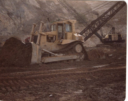 Bulldozer working on rescue/salvage of dragline, 1980
