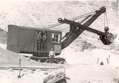 Antonio Carta (front) and steam shovel crew at Colonial�s Garden City plant, N.Y., 1930